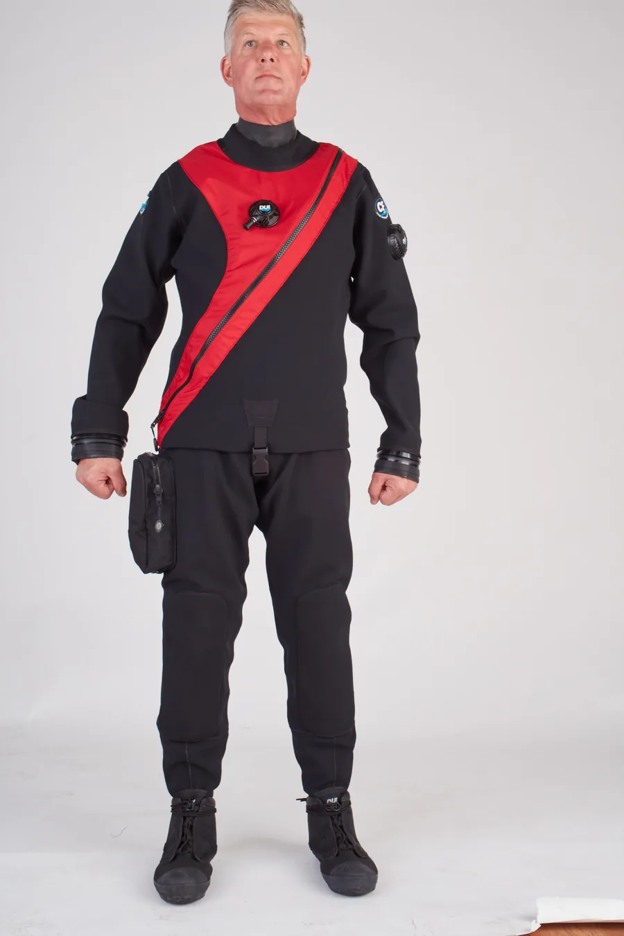 DUI CF200X drysuit in red on a model, unretouched shoot frame