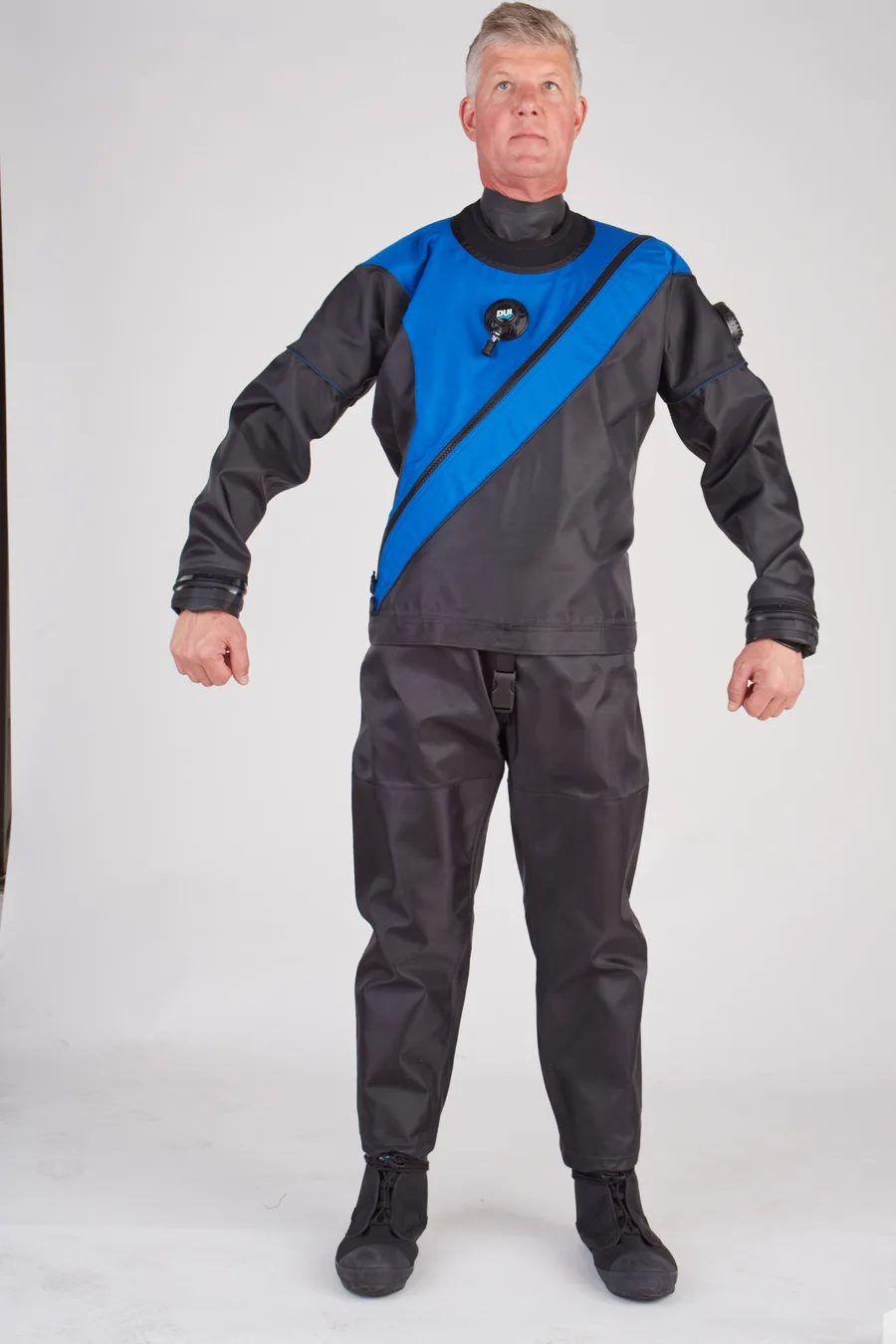 DUI TLS350 drysuit in Elite Blue on a model, unretouched shoot frame